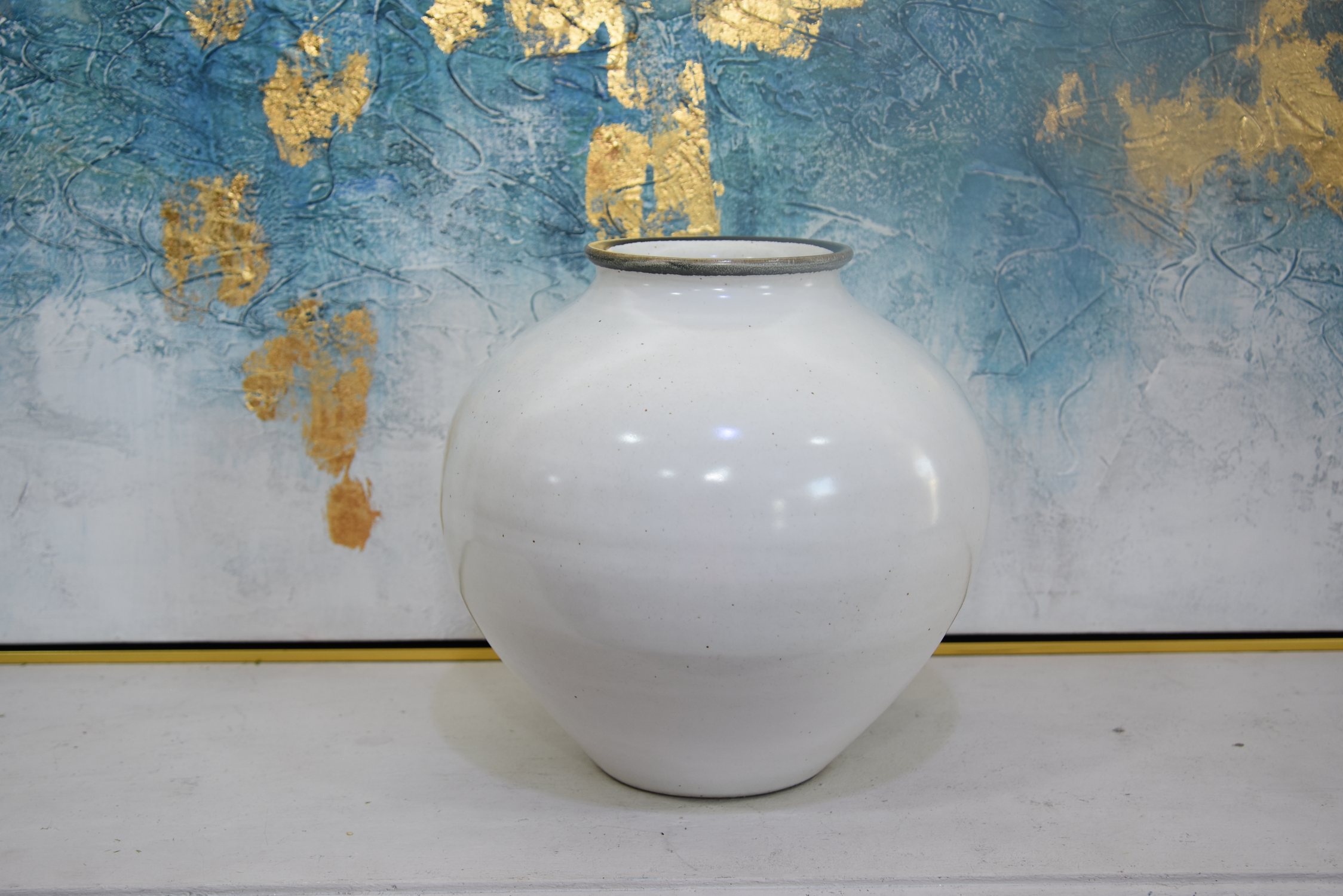 White pottery art vase