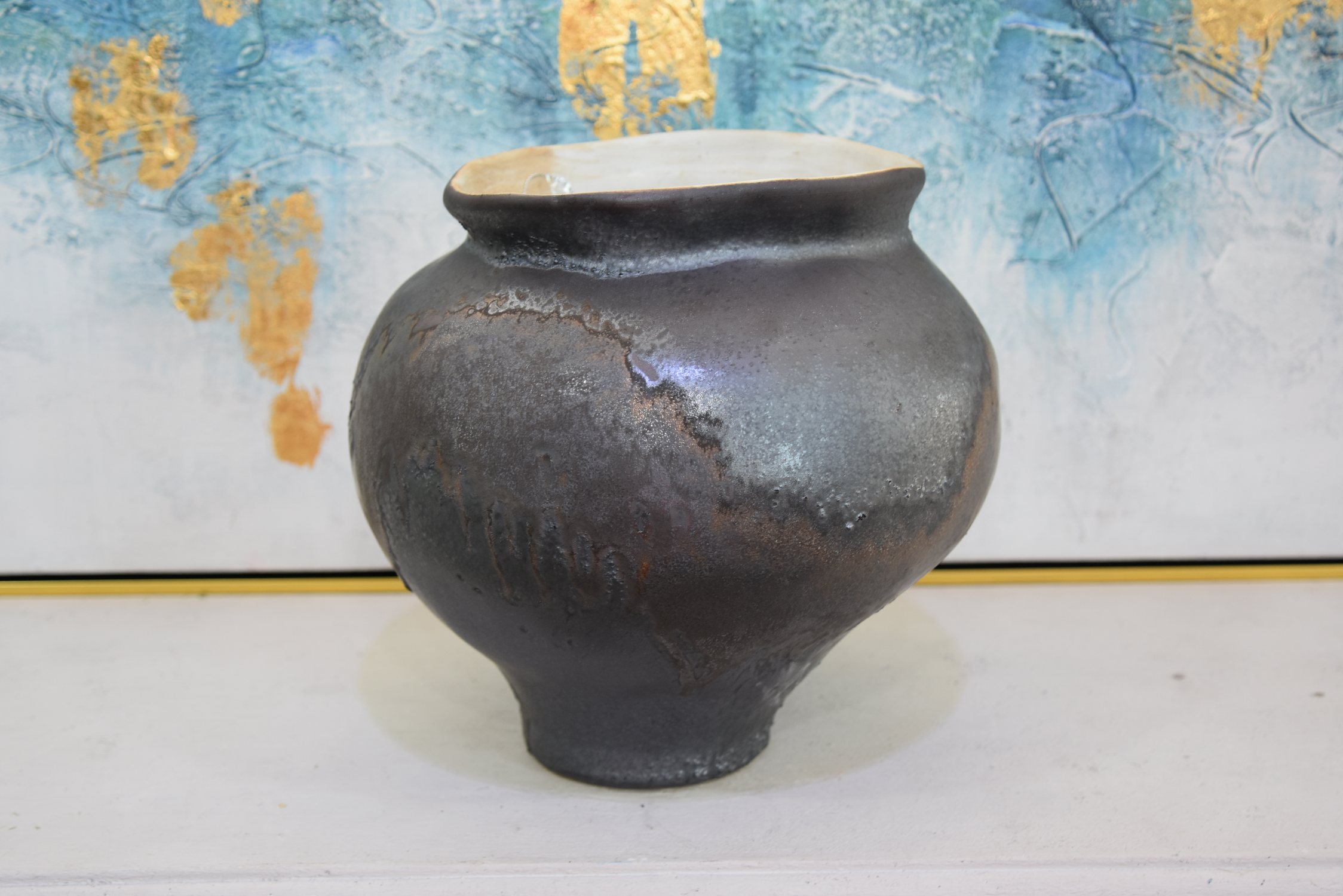 Asymmetrical art pottery vase